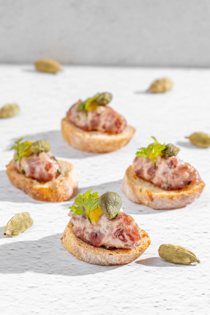 Beef Tartar Polmard, Capers, Savora Mustard on Toasted Baguette (One Dozen)